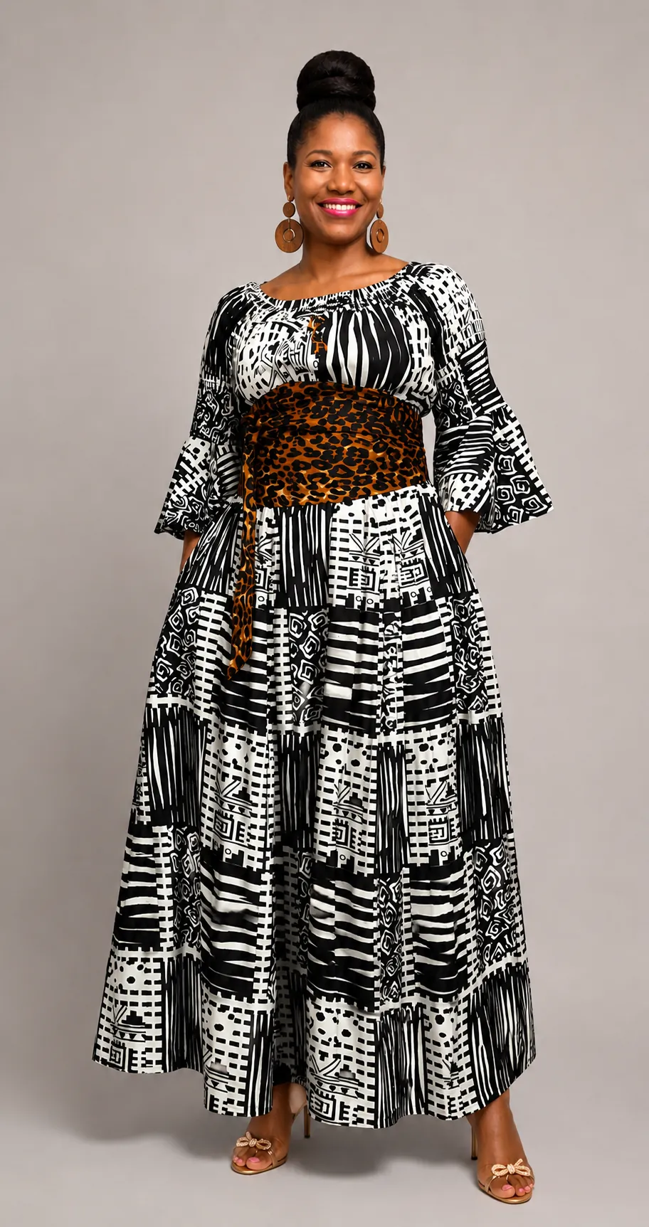 Leopard sash belt paired with a black and white printed maxi dress